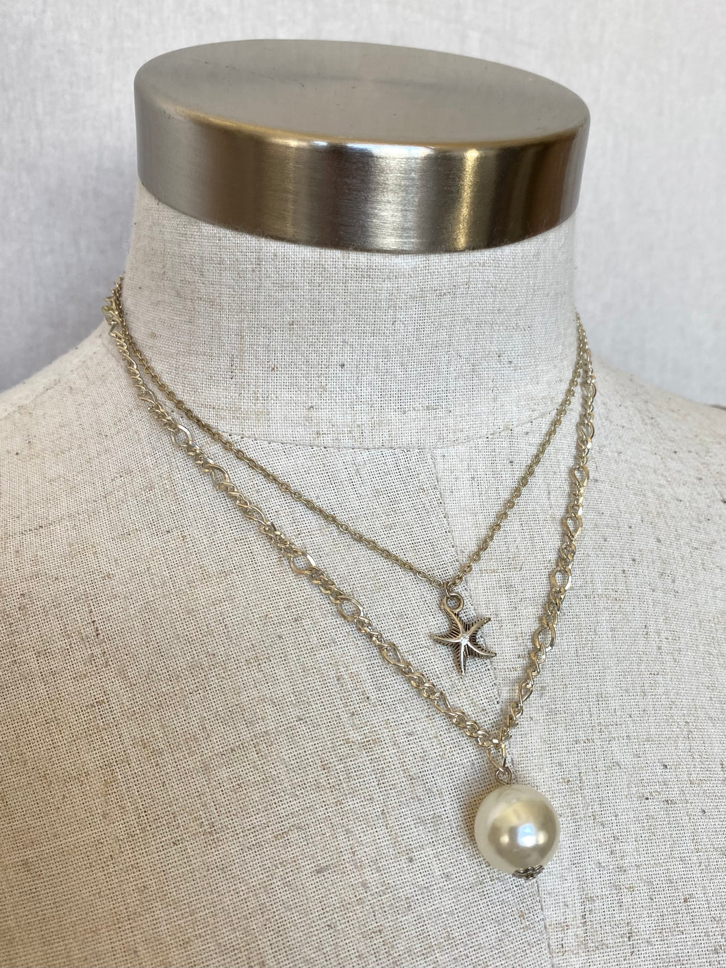 Starfish and pearl necklace