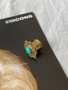 Turquoise ear plug